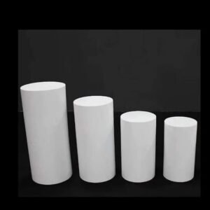 4 white round plinths